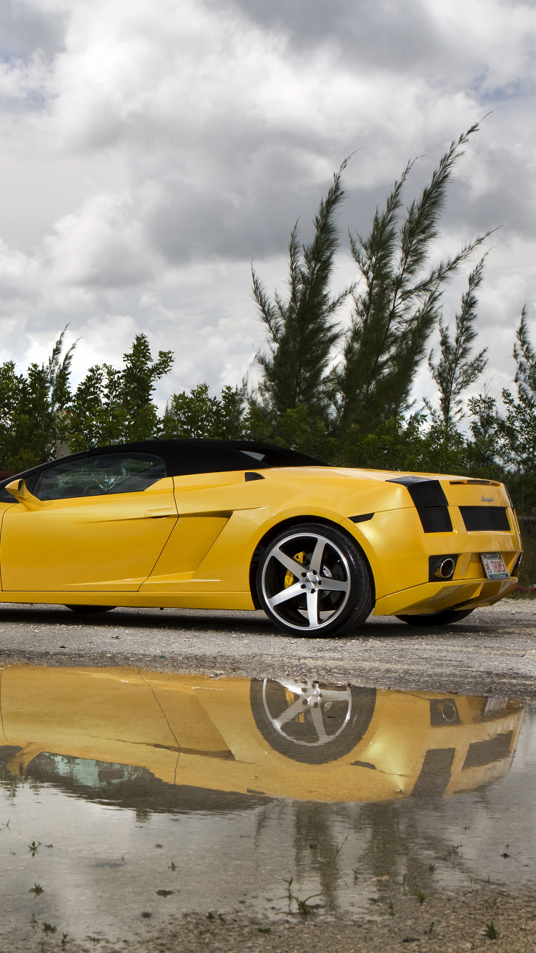 Yellow Ferrari 458 Italia on Water. Wallpaper in 750x1334 Resolution