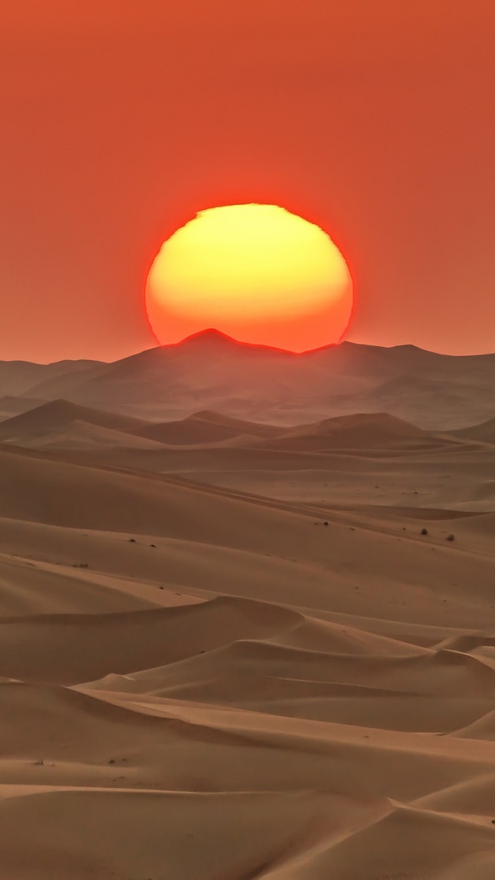 White Sand Under Orange Sky During Sunset. Wallpaper in 720x1280 Resolution