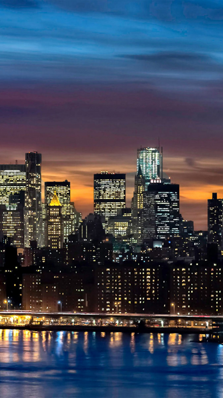 City Skyline During Night Time. Wallpaper in 750x1334 Resolution