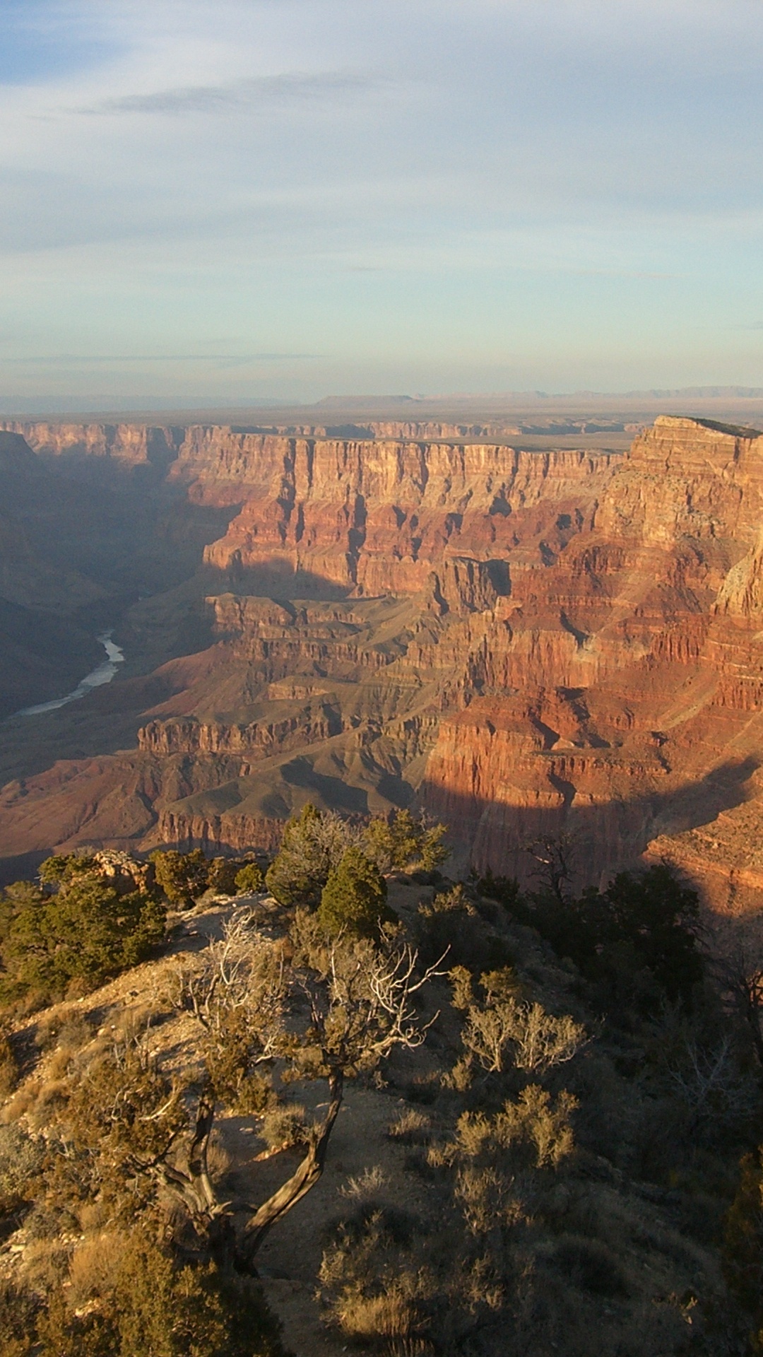 Brown Rocky Mountain Under White Sky During Daytime. Wallpaper in 1080x1920 Resolution