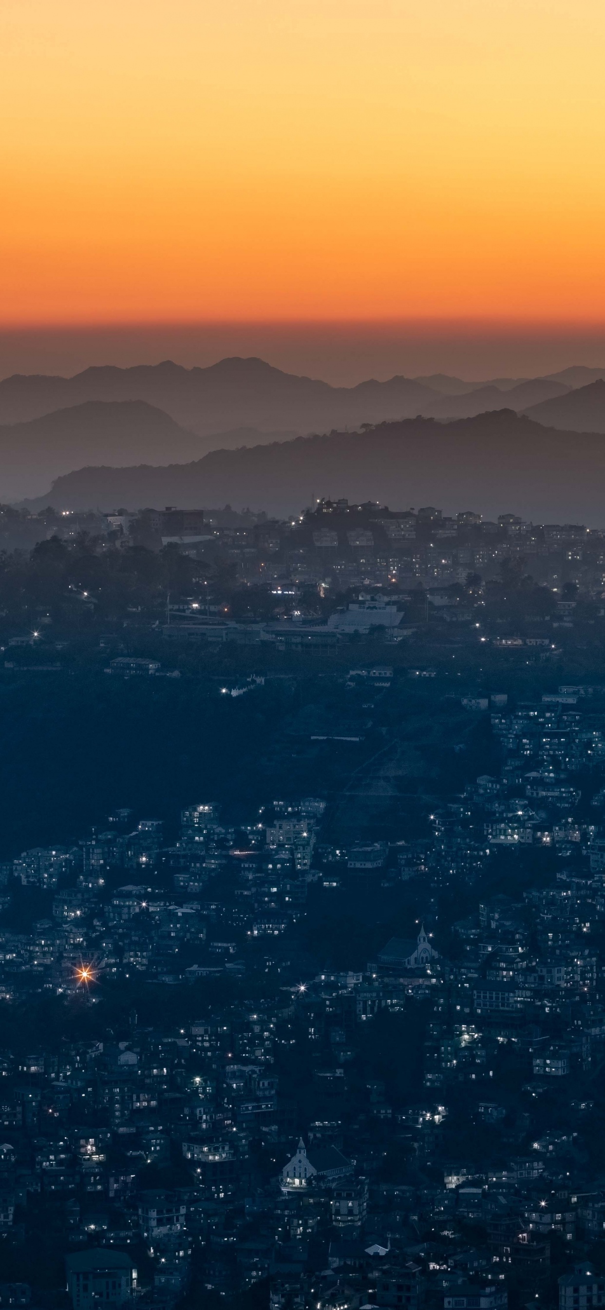 Aerial View of City During Night Time. Wallpaper in 1242x2688 Resolution