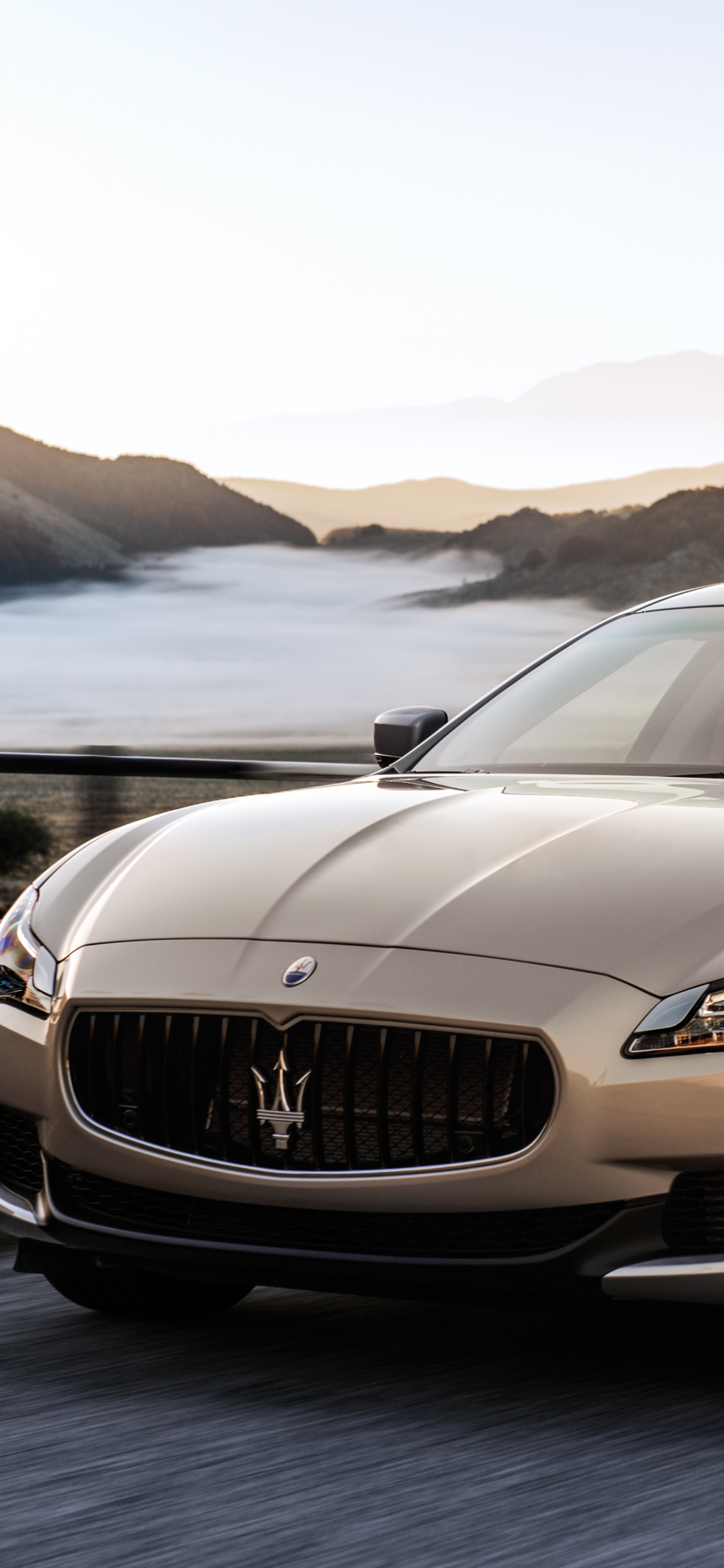 Black Mercedes Benz Coupe on Gray Sand Near Body of Water During Daytime. Wallpaper in 1242x2688 Resolution