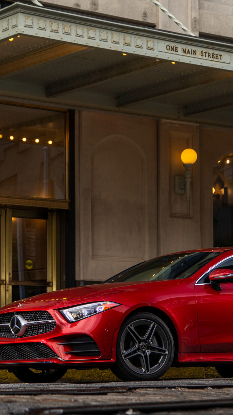 Red Porsche 911 Parked in Front of Building. Wallpaper in 750x1334 Resolution