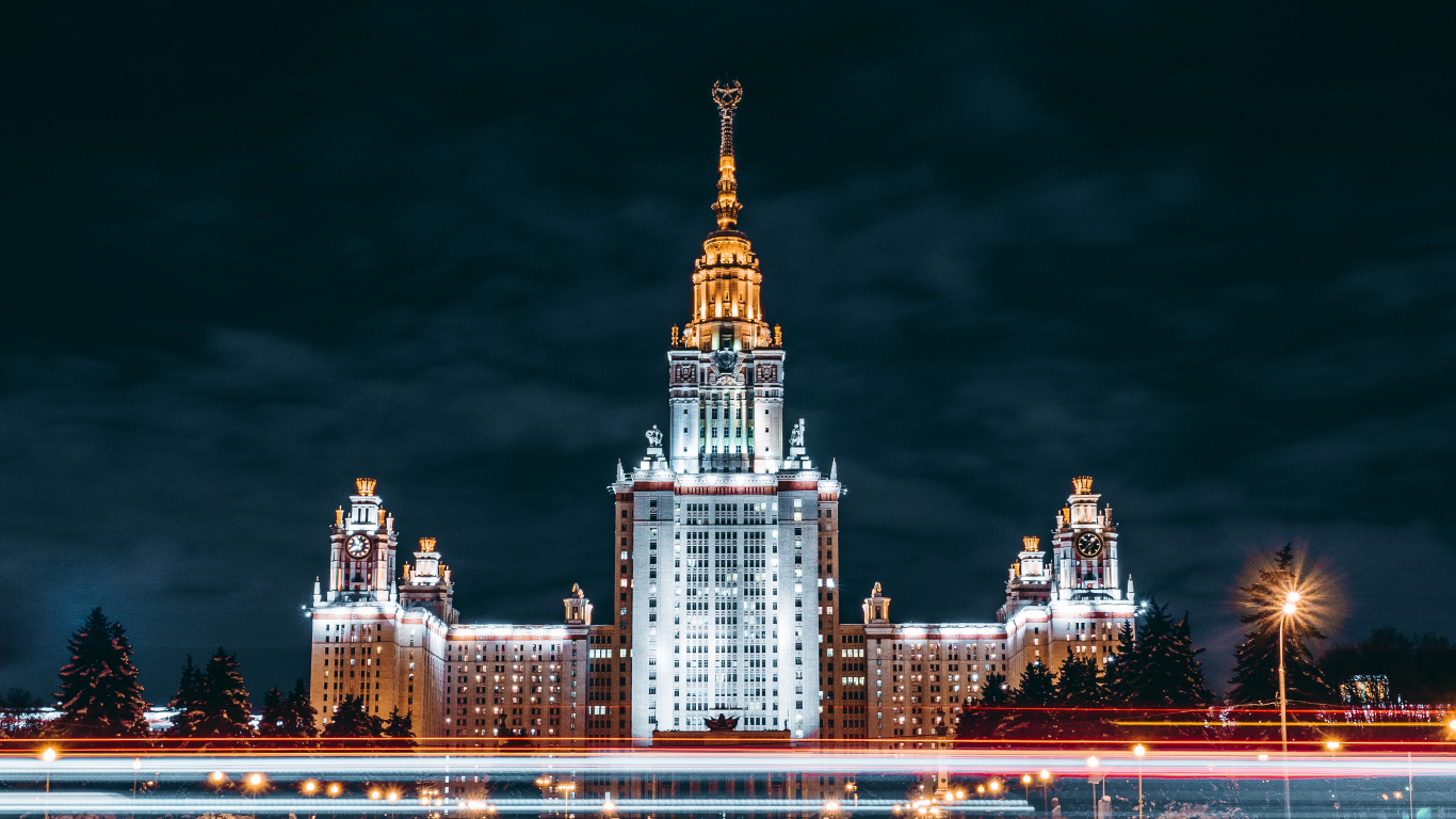 Zeitrafferfotografie Der Skyline Der Stadt Bei Nacht. Wallpaper in 1366x768 Resolution