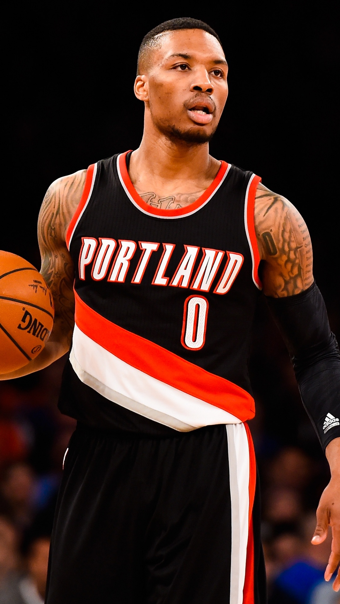 Man in Black and Orange Nike Jersey Shirt. Wallpaper in 1080x1920 Resolution