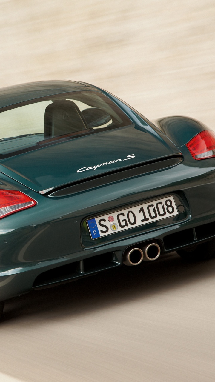 Black Porsche 911 on Brown Wooden Floor. Wallpaper in 720x1280 Resolution