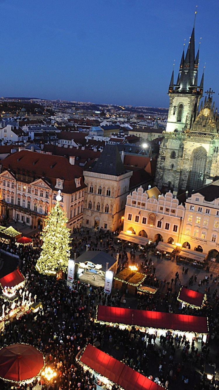 Weißes Und Schwarzes Betongebäude Während Der Nacht. Wallpaper in 750x1334 Resolution