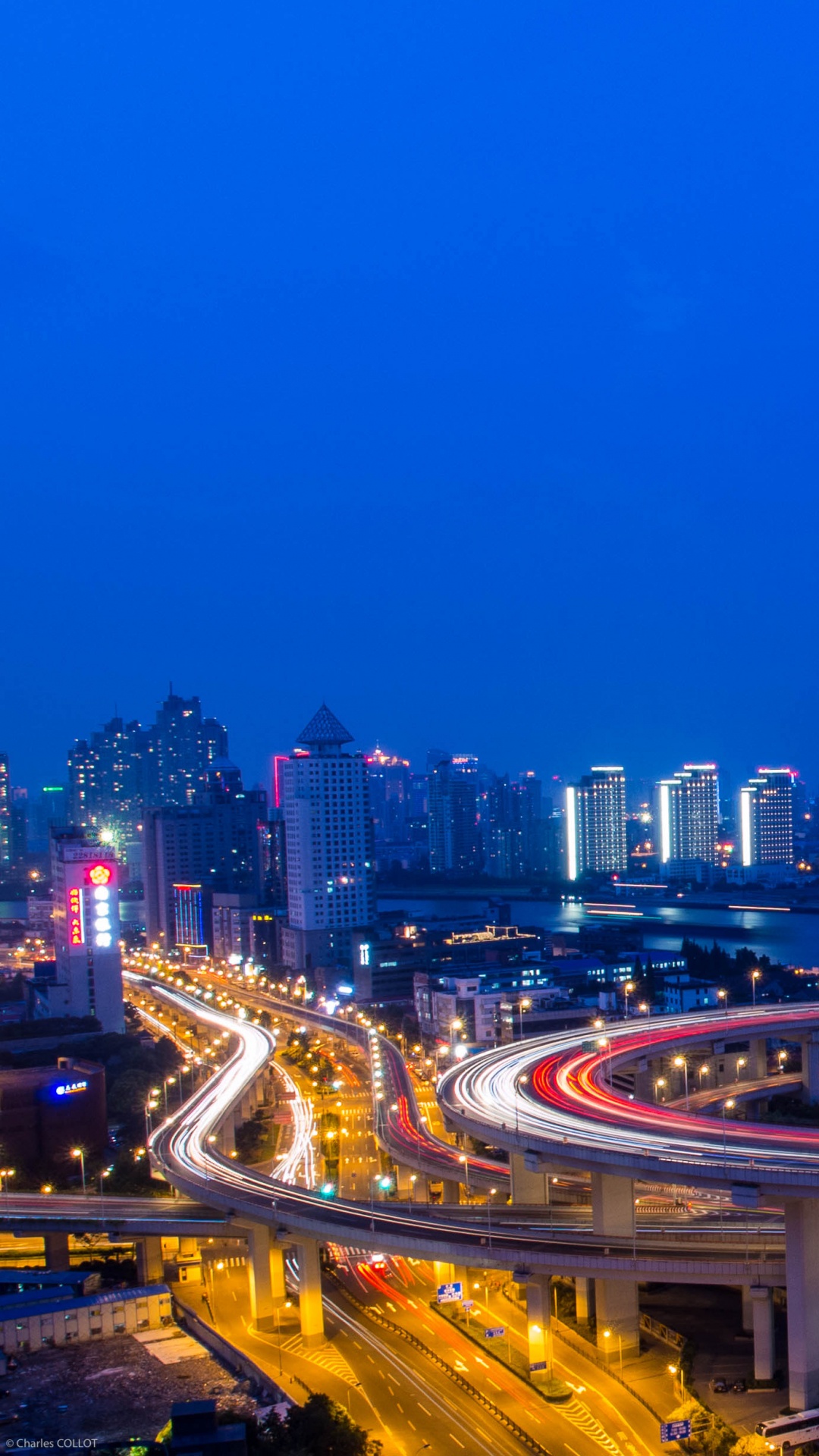 City With High Rise Buildings During Night Time. Wallpaper in 1080x1920 Resolution