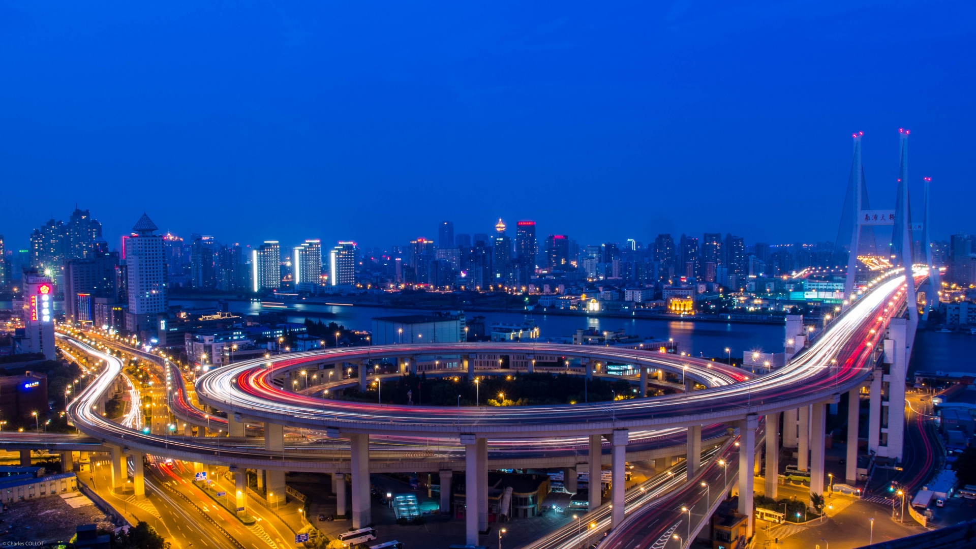 City With High Rise Buildings During Night Time. Wallpaper in 1920x1080 Resolution