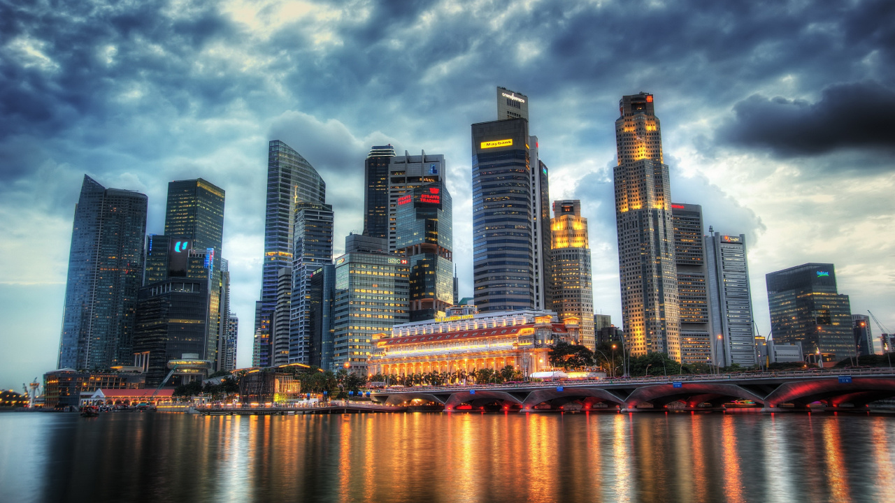 City Skyline Across Body of Water During Night Time. Wallpaper in 1280x720 Resolution
