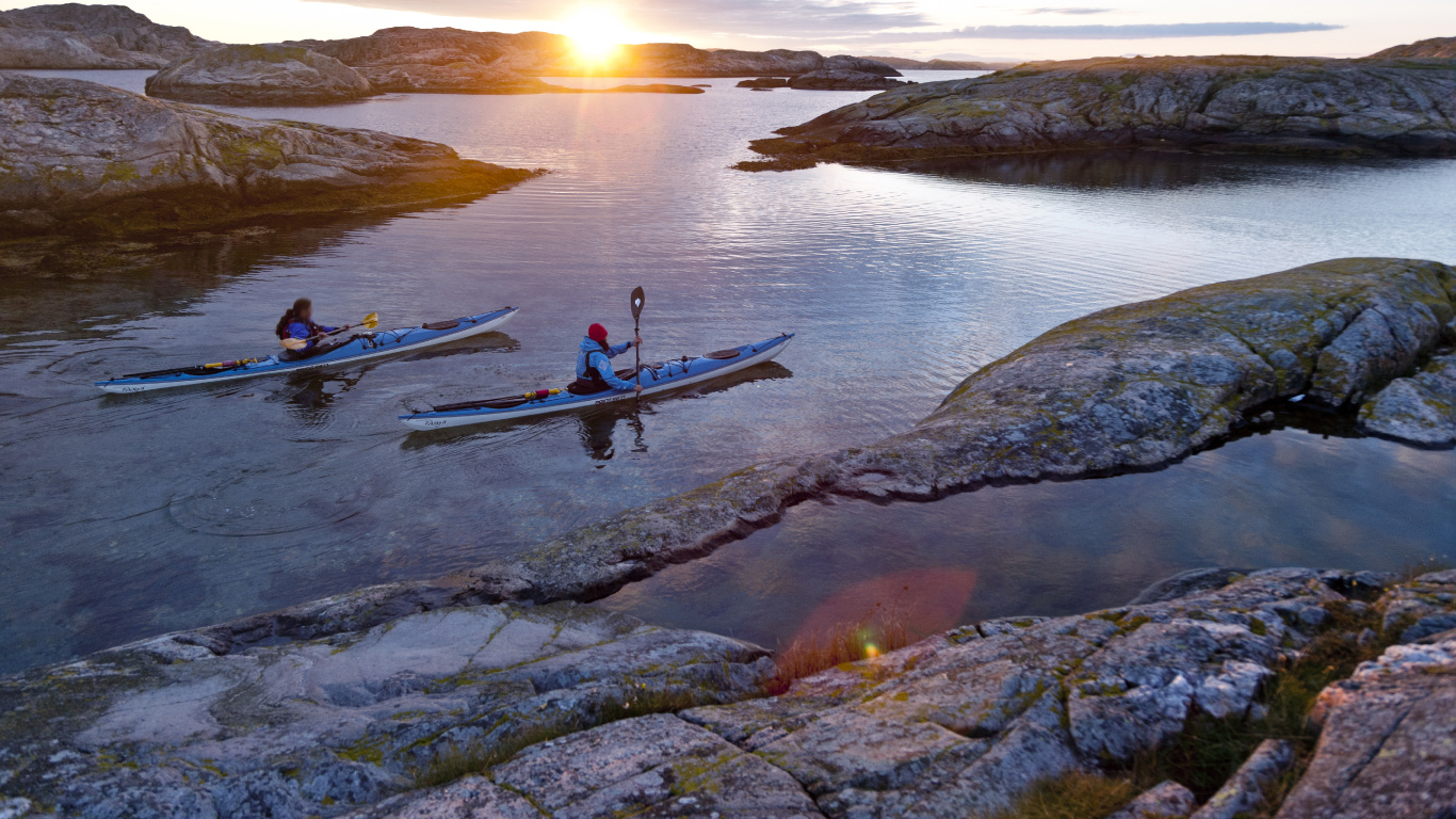 2 Men Riding on Boat During Sunset. Wallpaper in 1366x768 Resolution