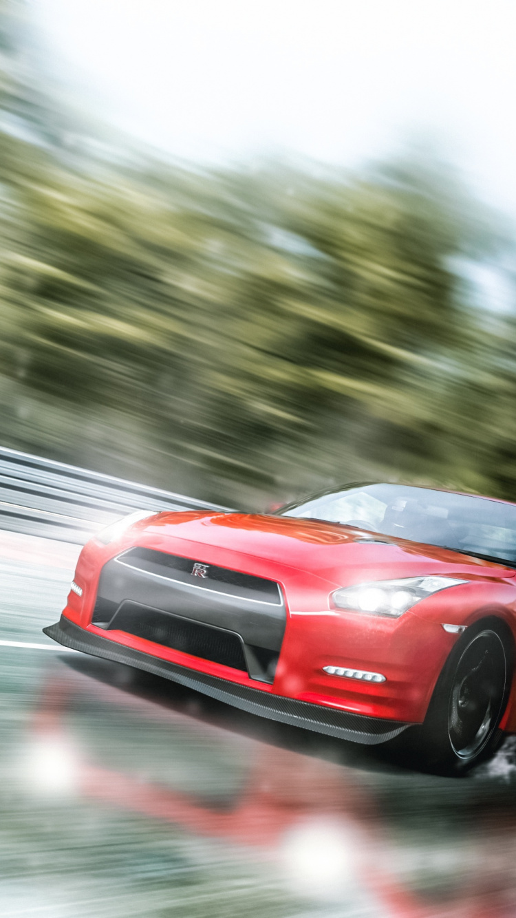 Red Ferrari Car on Road During Daytime. Wallpaper in 750x1334 Resolution