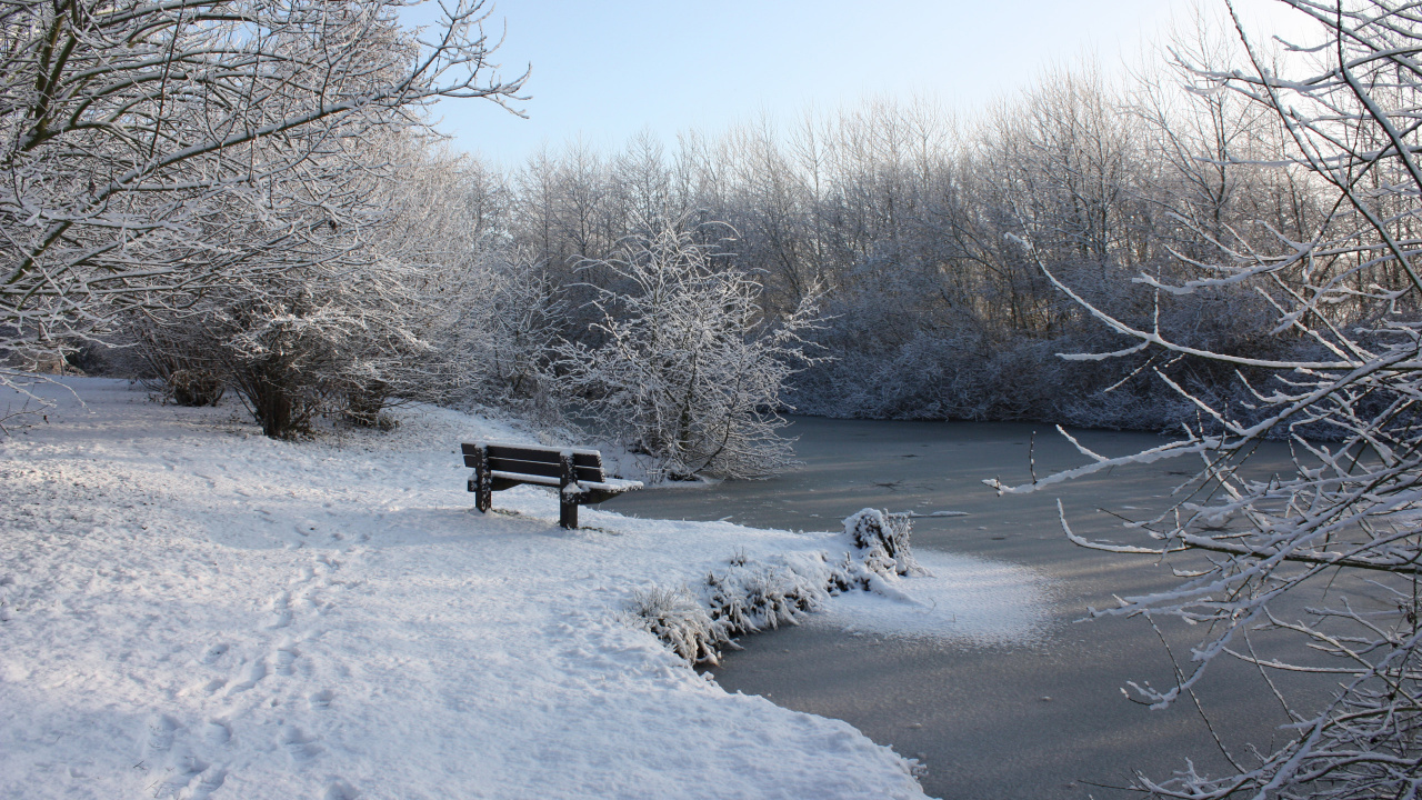Brown Wooden Bench on Snow Covered Ground During Daytime. Wallpaper in 1280x720 Resolution