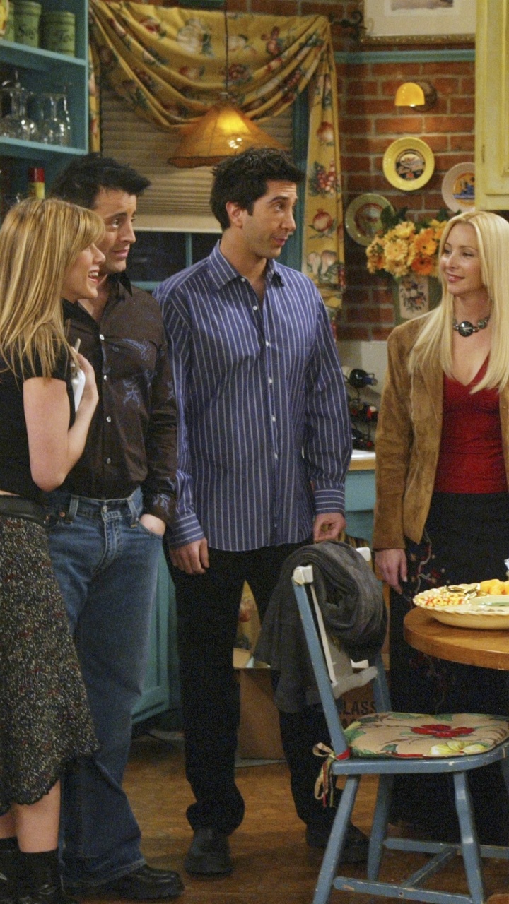 People Standing and Sitting on Chairs. Wallpaper in 720x1280 Resolution