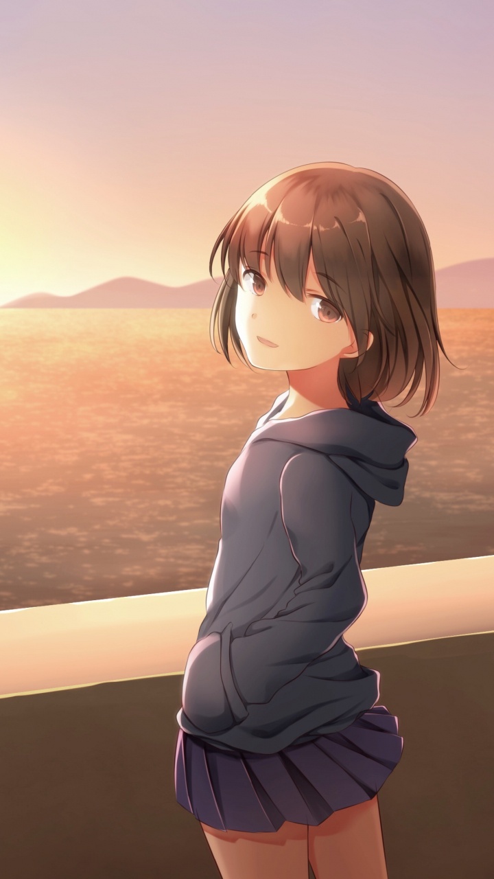 Mujer en Camisa Blanca de Manga Larga y Falda Azul de Pie Sobre la Arena Marrón Durante la Puesta de Sol. Wallpaper in 720x1280 Resolution