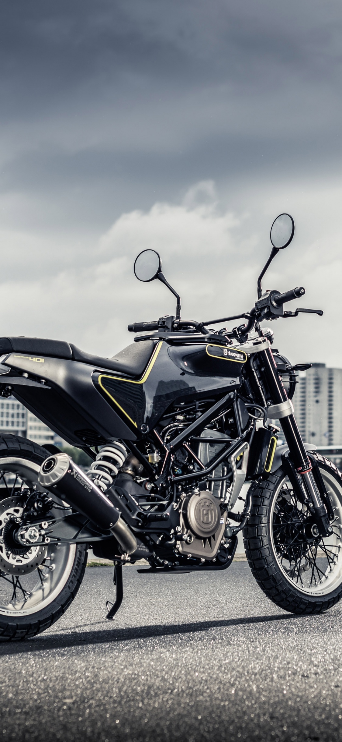 Black Motorcycle on Gray Asphalt Road During Daytime. Wallpaper in 1125x2436 Resolution