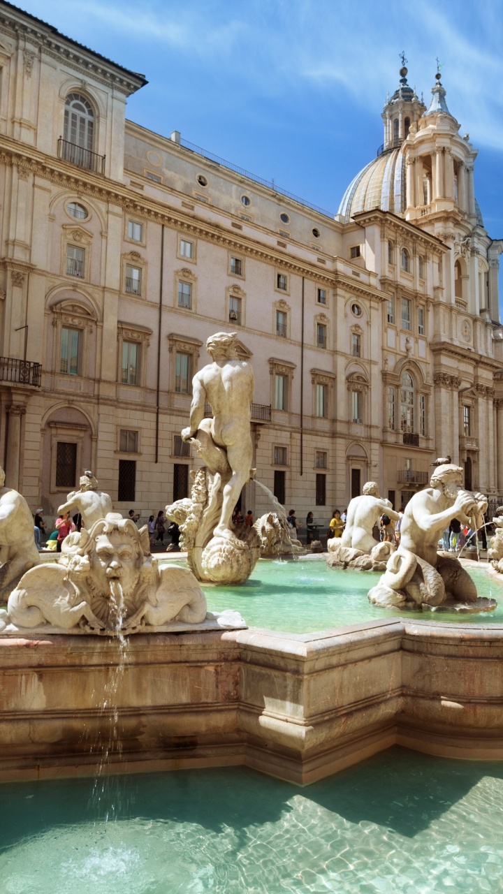 Menschen im Schwimmbad in Der Nähe Des Gebäudes Tagsüber. Wallpaper in 720x1280 Resolution