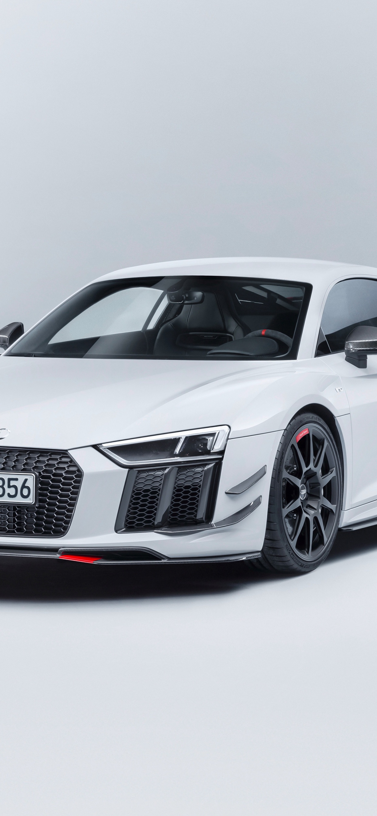 Black Audi r 8 Coupe. Wallpaper in 1242x2688 Resolution