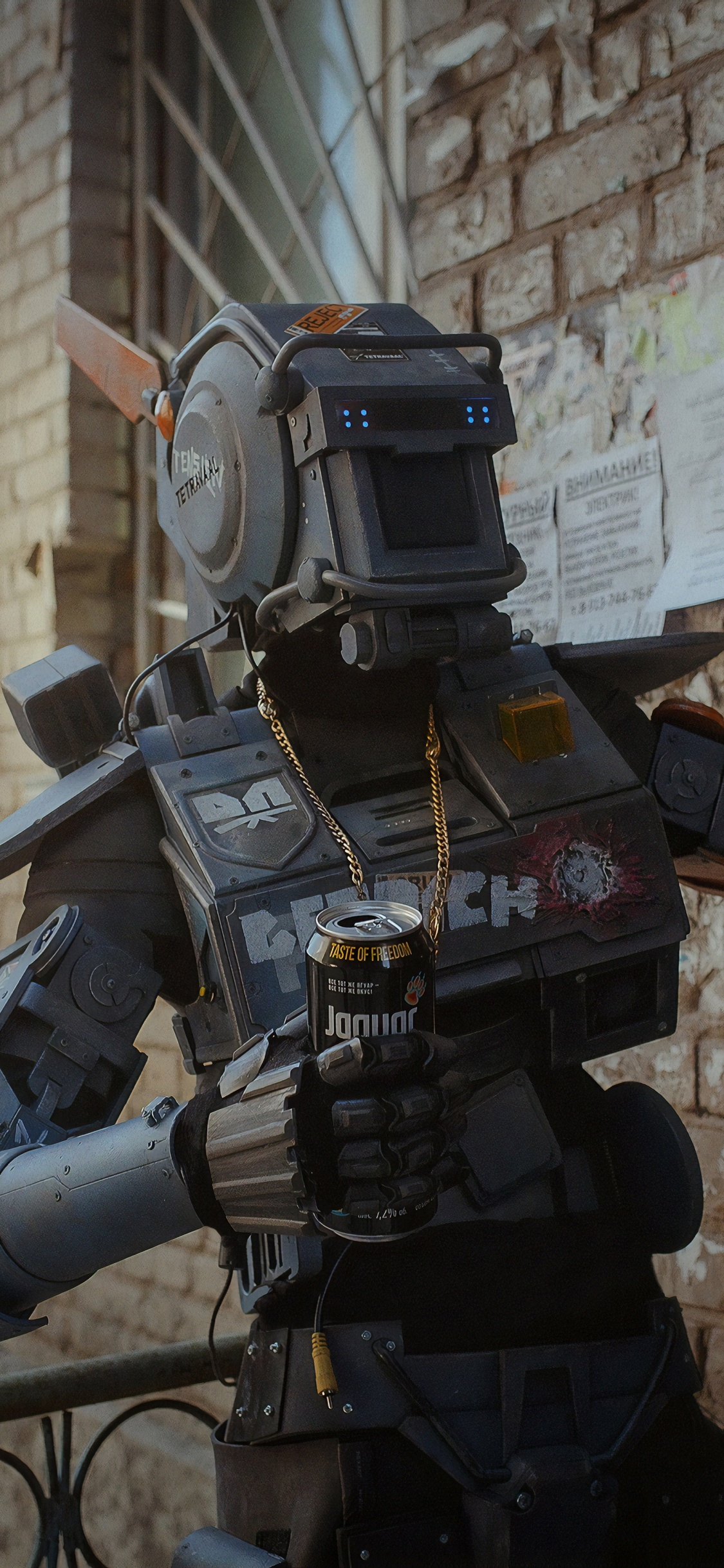 Grauer Roboter Mit Schwarzer Und Oranger Pistole. Wallpaper in 1125x2436 Resolution