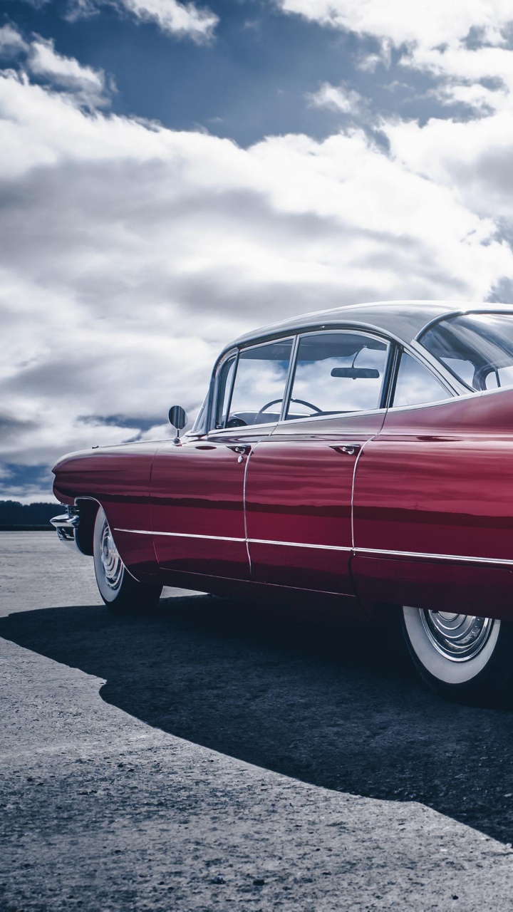 Red Mercedes Benz Coupe on Gray Asphalt Road Under Blue and White Sunny Cloudy Sky During. Wallpaper in 720x1280 Resolution