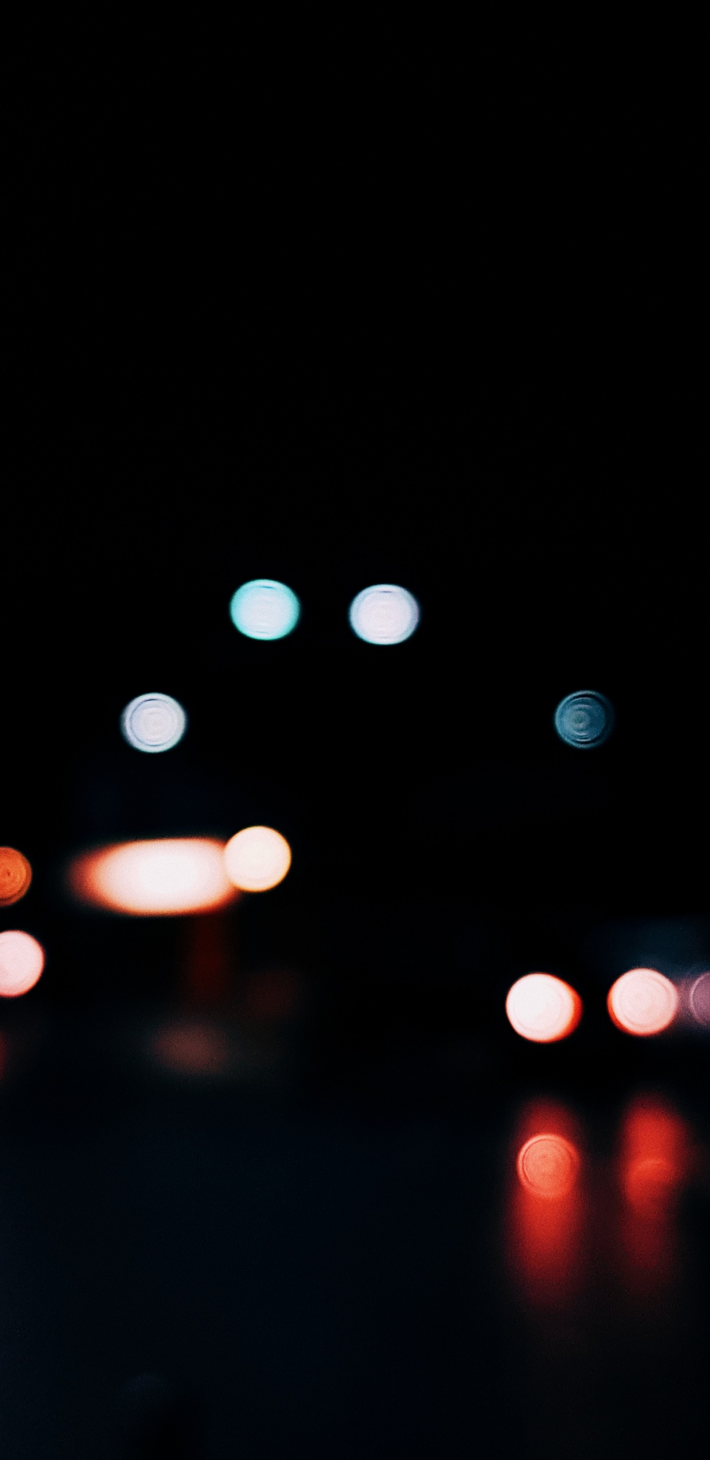 Bokeh-Fotografie Der Lichter Der Stadt Während Der Nacht. Wallpaper in 1440x2960 Resolution