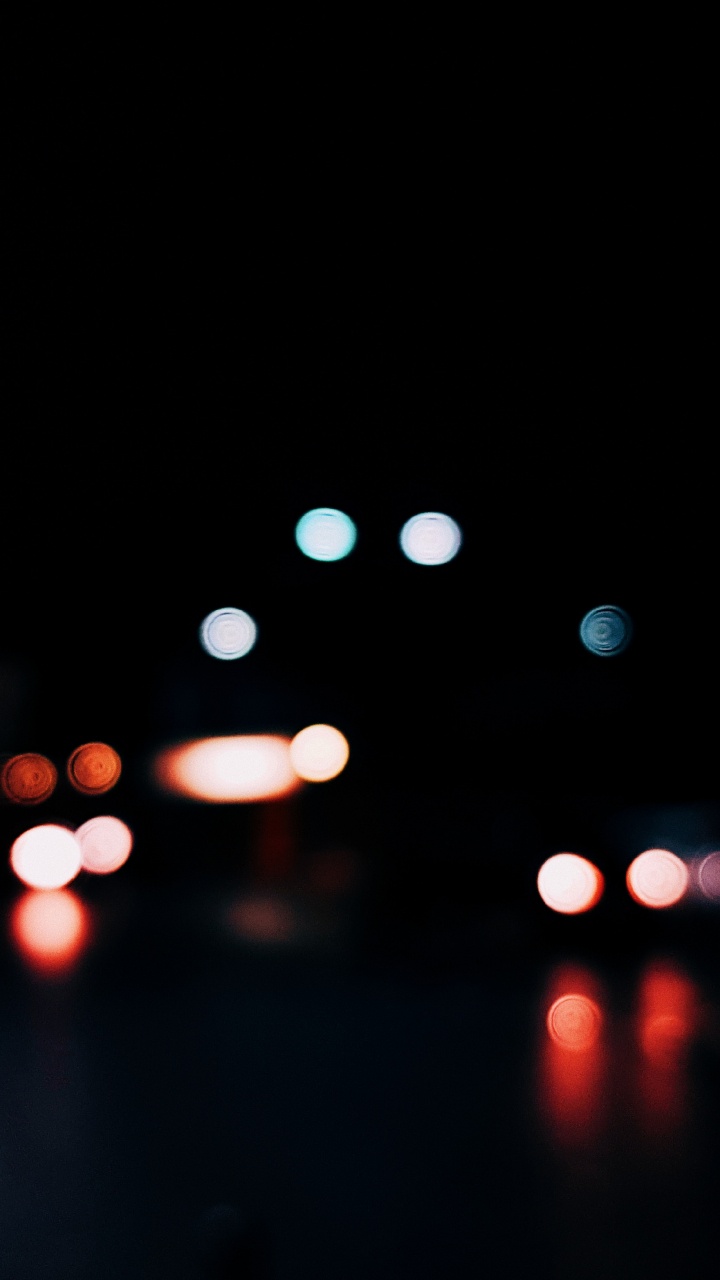 Bokeh-Fotografie Der Lichter Der Stadt Während Der Nacht. Wallpaper in 720x1280 Resolution