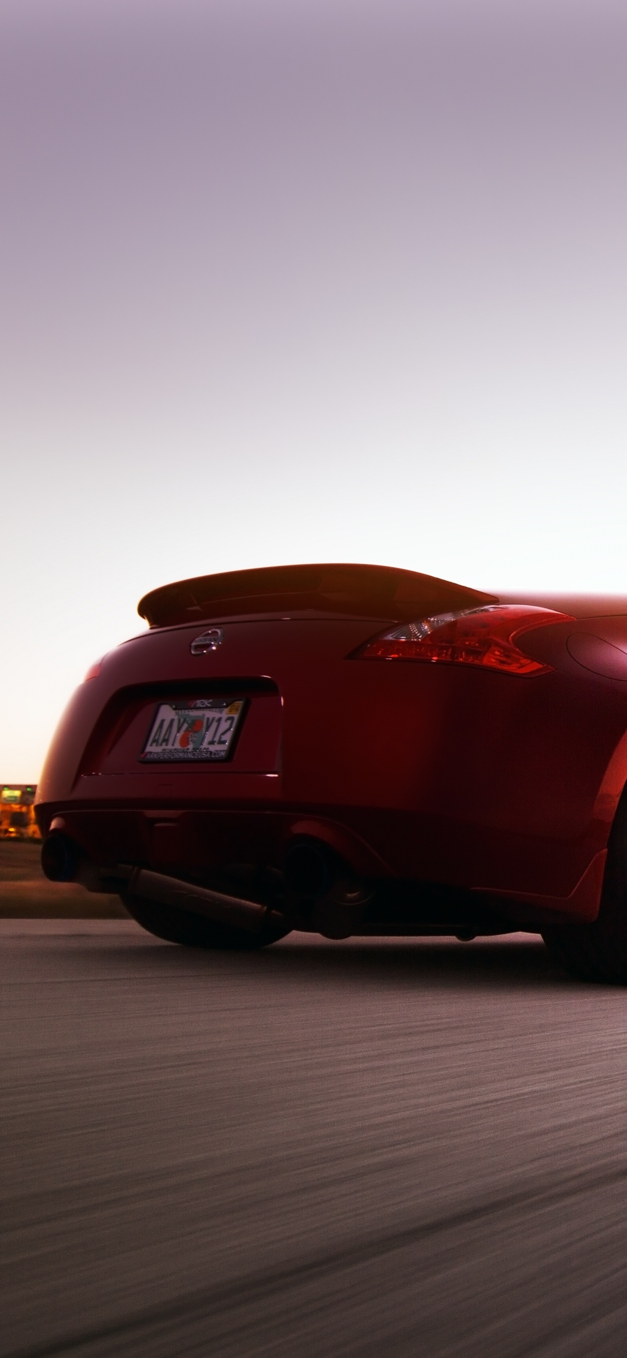 Porsche 911 Rouge Sur Sable Brun. Wallpaper in 1242x2688 Resolution