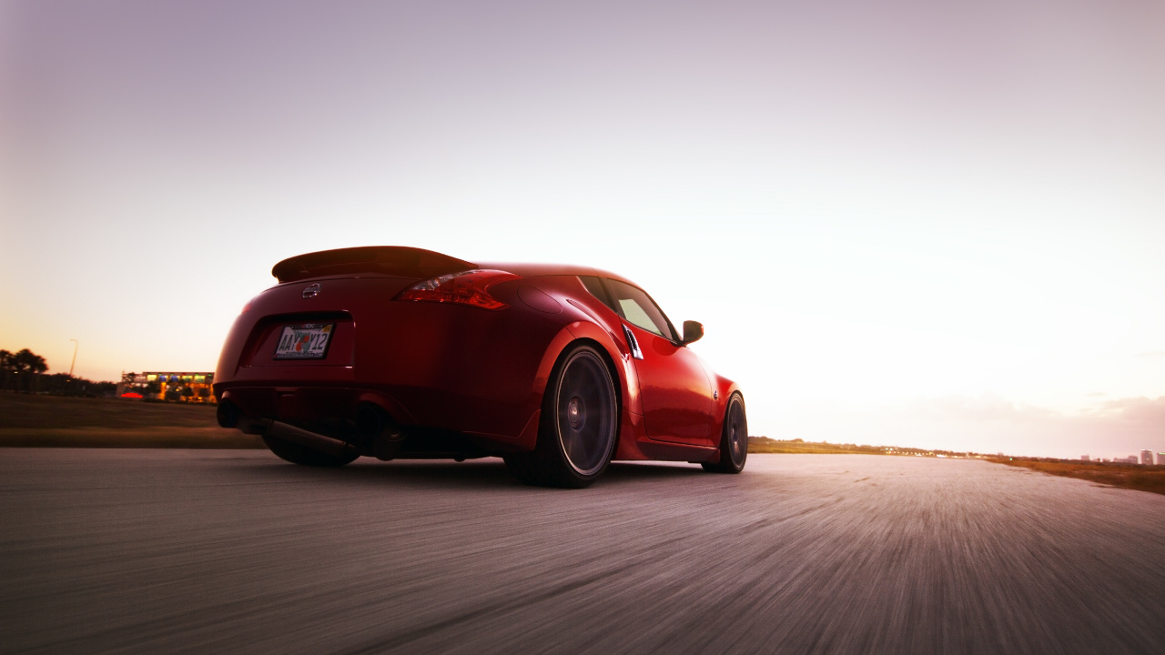 Porsche 911 Rouge Sur Sable Brun. Wallpaper in 1280x720 Resolution