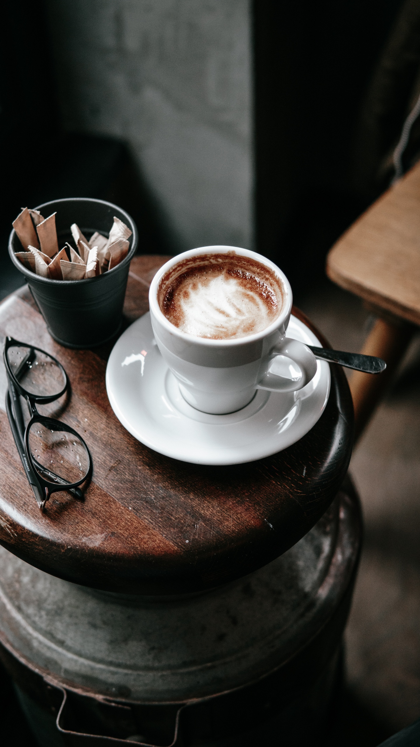 White Ceramic Cup With Saucer on Brown Wooden Round Table. Wallpaper in 1440x2560 Resolution