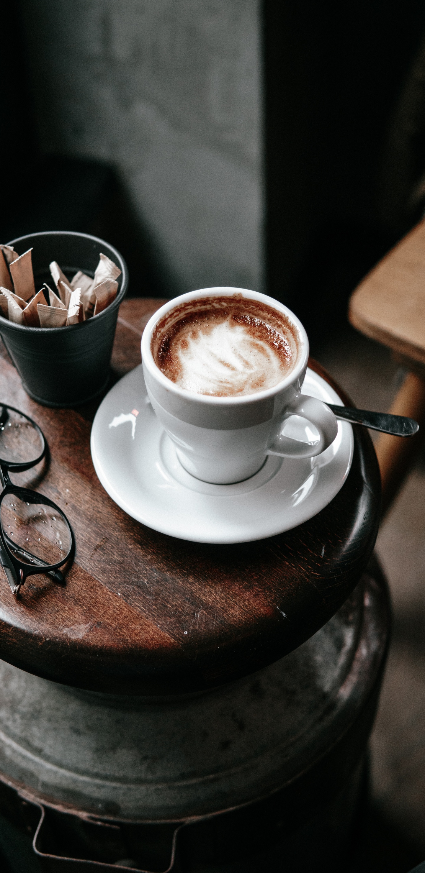 White Ceramic Cup With Saucer on Brown Wooden Round Table. Wallpaper in 1440x2960 Resolution