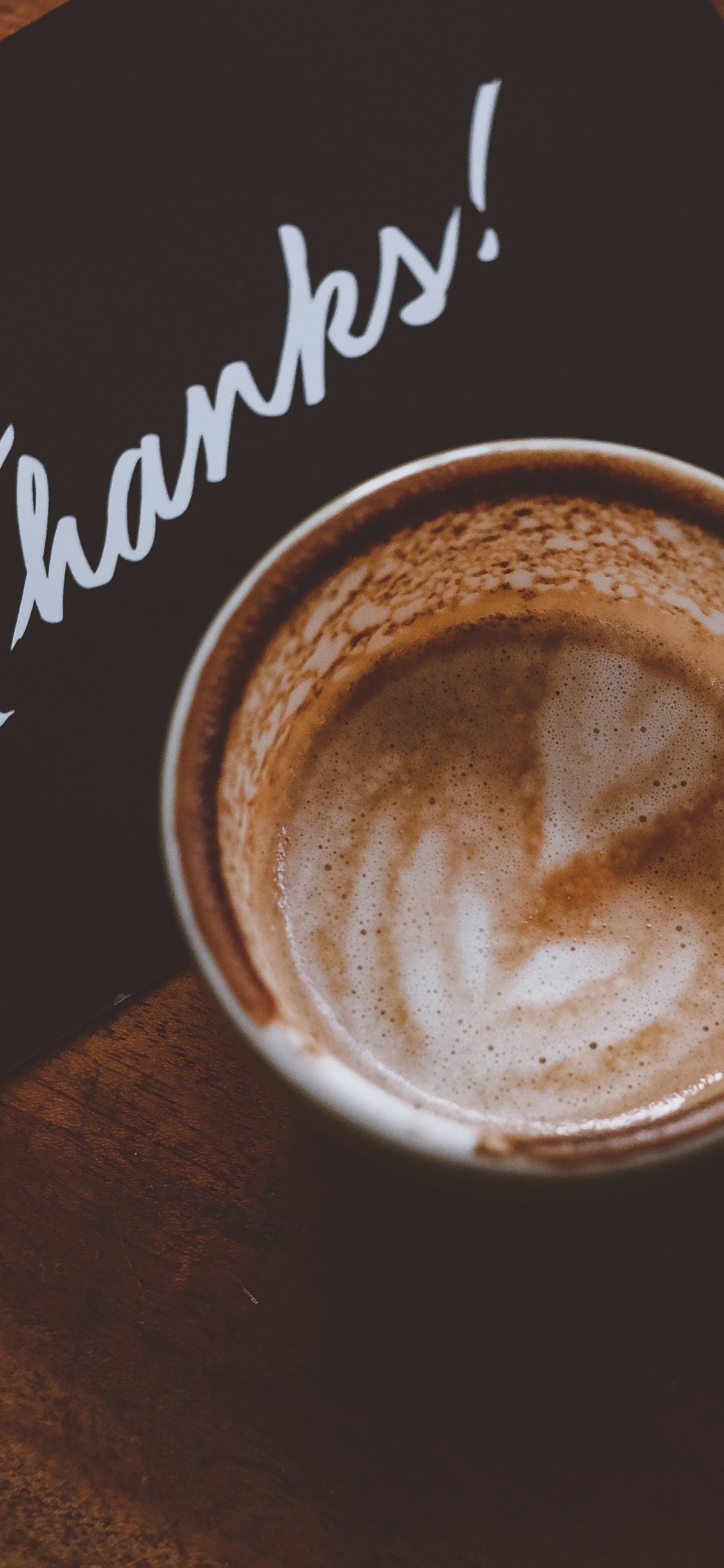 Black and White Ceramic Mug With Coffee. Wallpaper in 1125x2436 Resolution