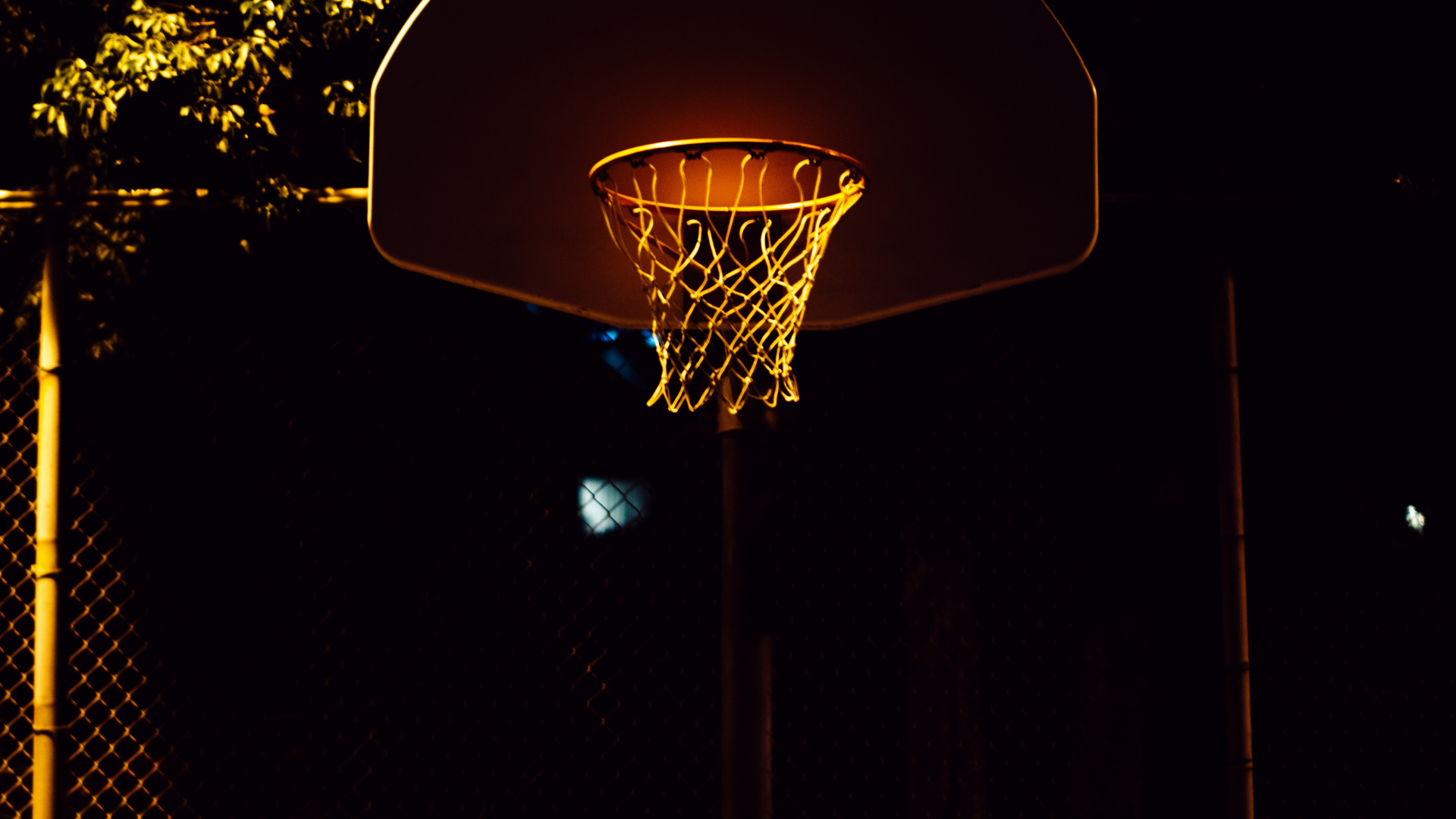 Basketball Hoop With Light Turned on During Night Time. Wallpaper in 1920x1080 Resolution