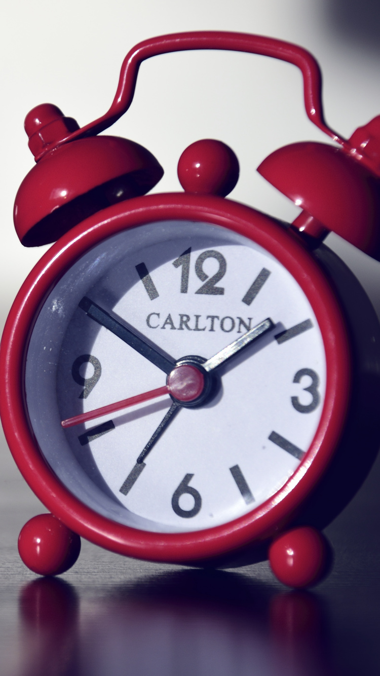 Download 750x1334 Wallpaper Red Alarm Clock at 10 10 Red Alarm Clock at 10 10. Wallpaper in 750x1334 Resolution