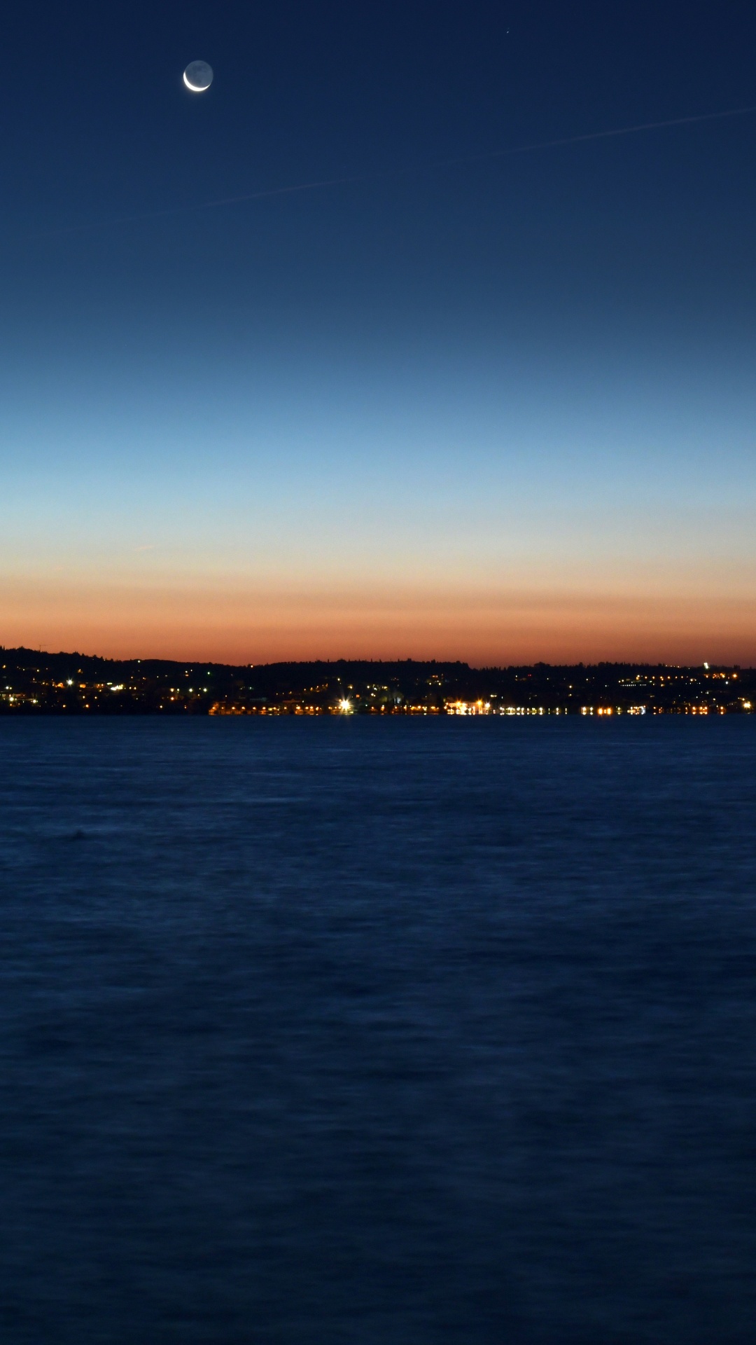 Body of Water Near Mountain During Sunset. Wallpaper in 1080x1920 Resolution