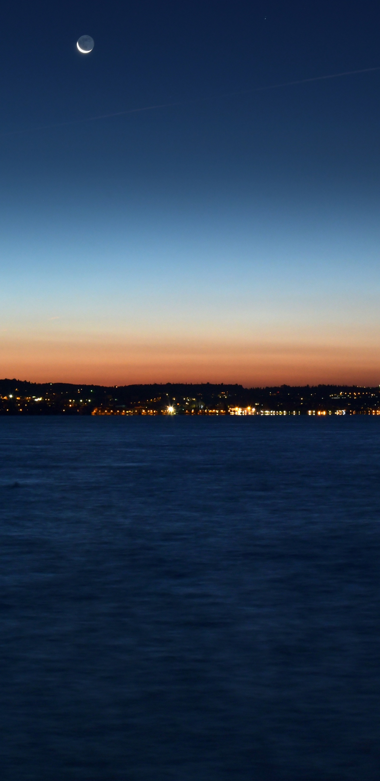 Body of Water Near Mountain During Sunset. Wallpaper in 1440x2960 Resolution