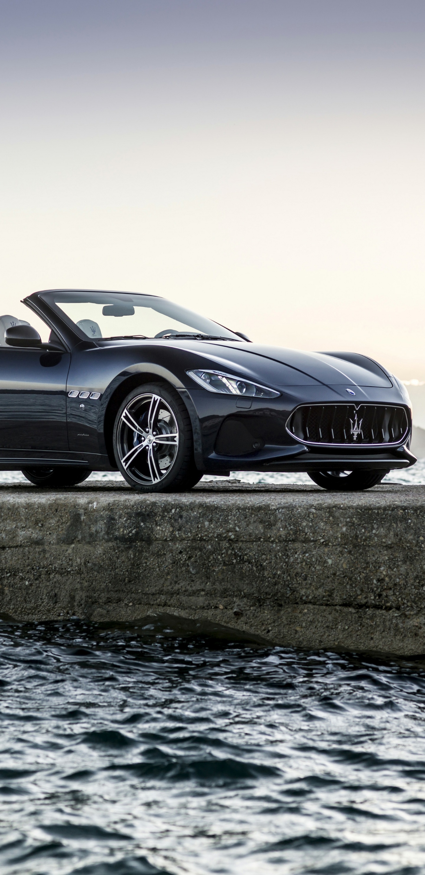 Black Coupe on Gray Concrete Road During Daytime. Wallpaper in 1440x2960 Resolution