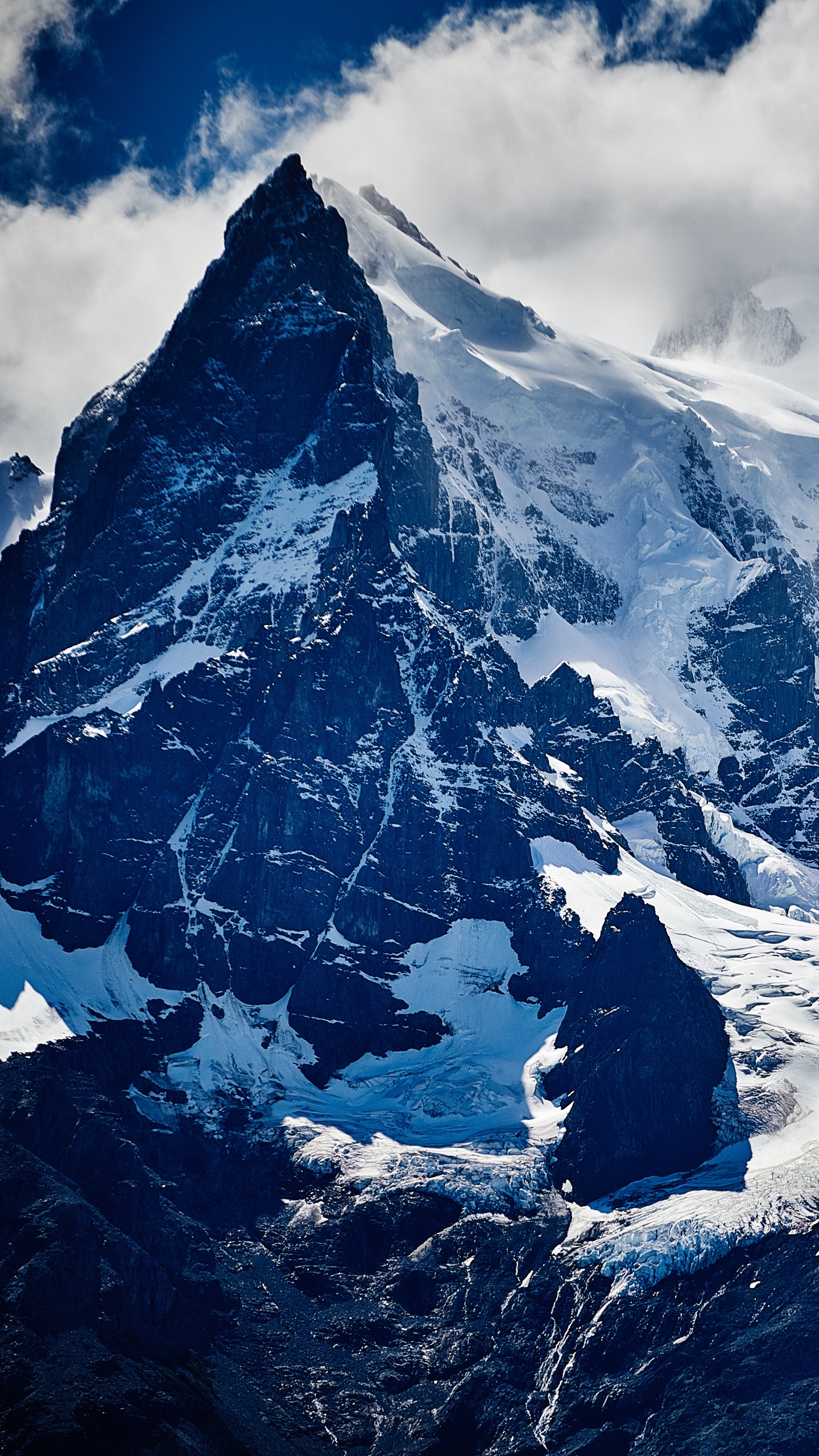 Snow Covered Mountain Under Cloudy Sky During Daytime. Wallpaper in 1440x2560 Resolution
