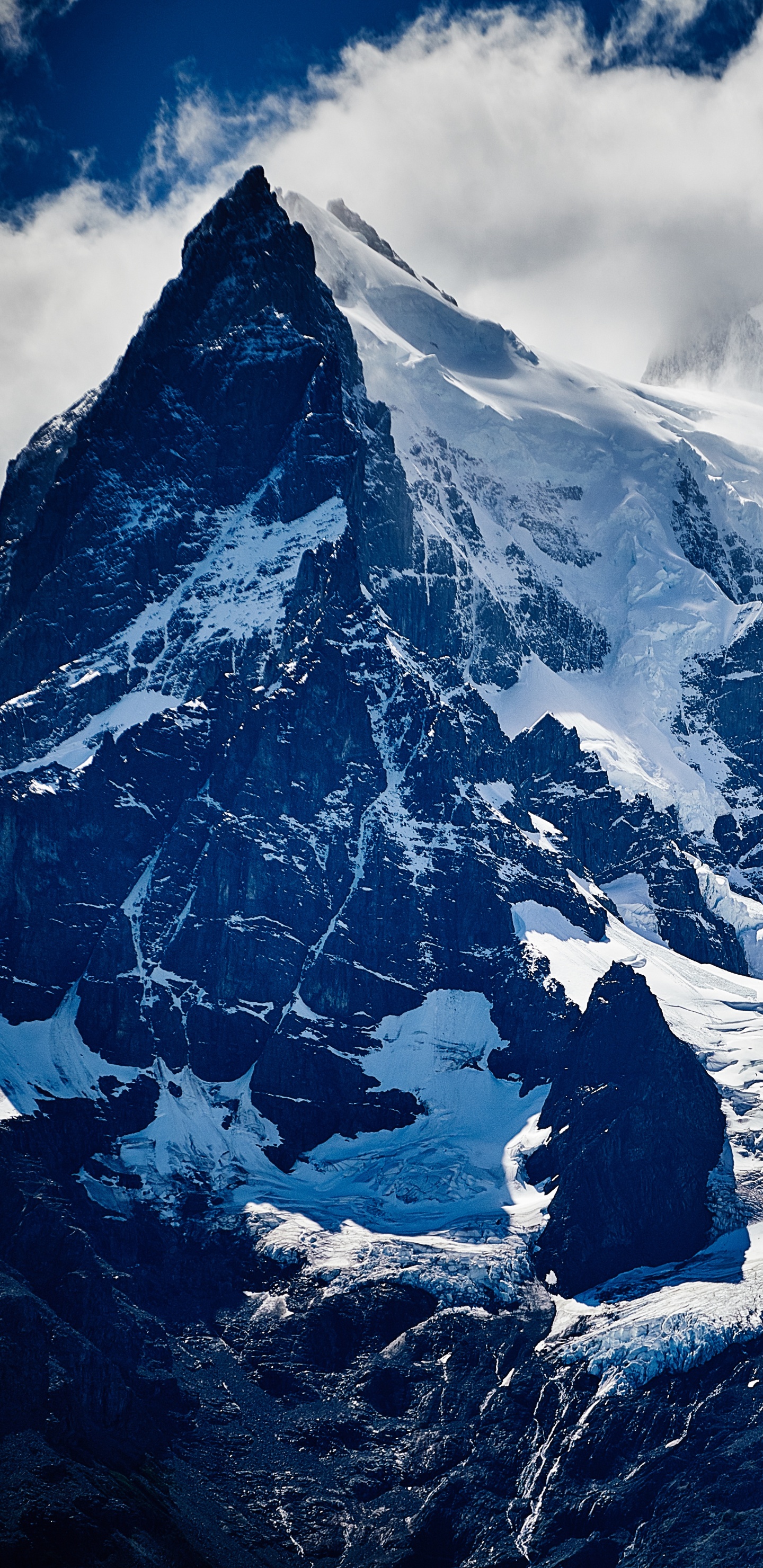 Snow Covered Mountain Under Cloudy Sky During Daytime. Wallpaper in 1440x2960 Resolution