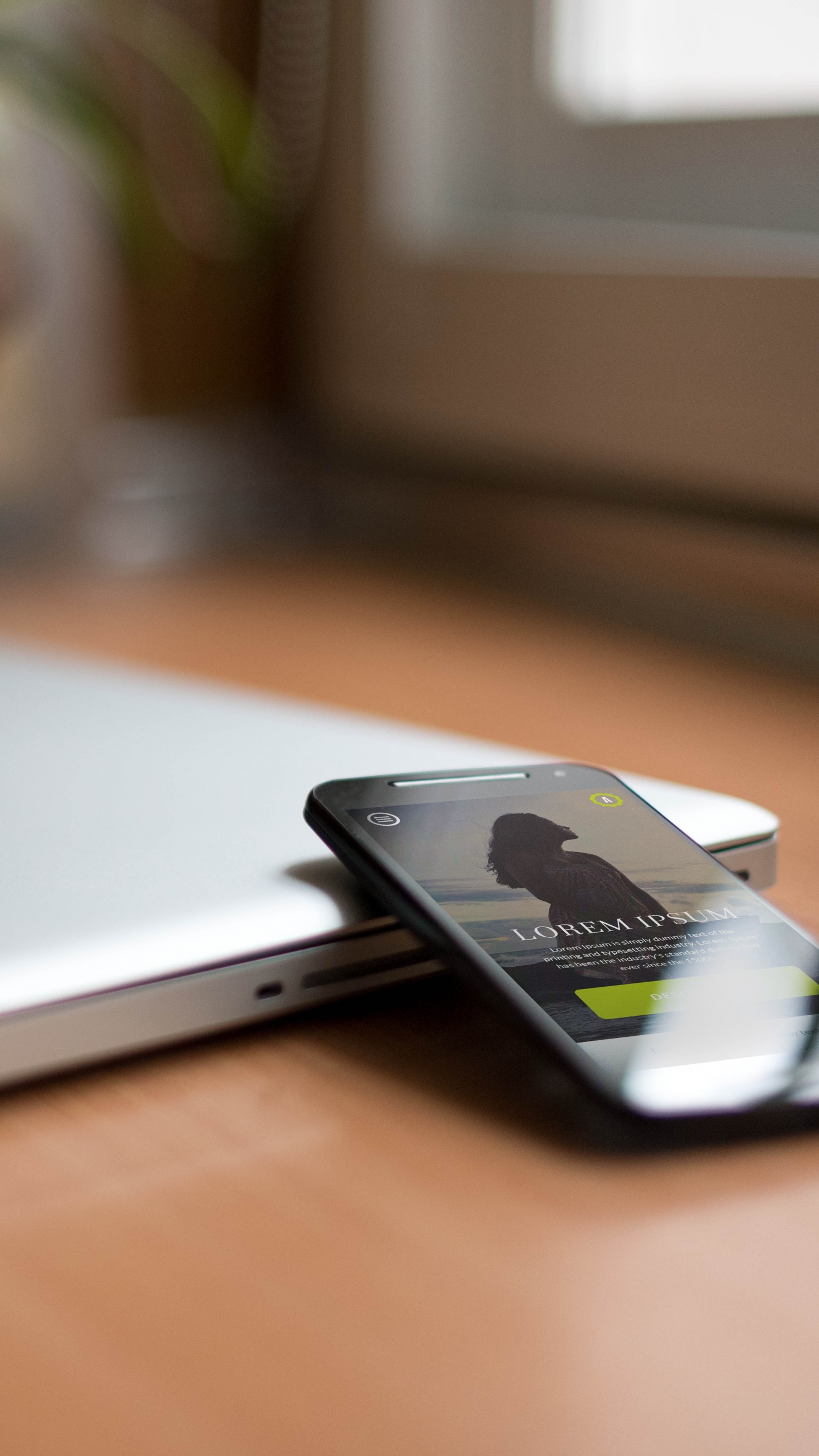 Silver Macbook on Brown Wooden Table. Wallpaper in 1440x2560 Resolution