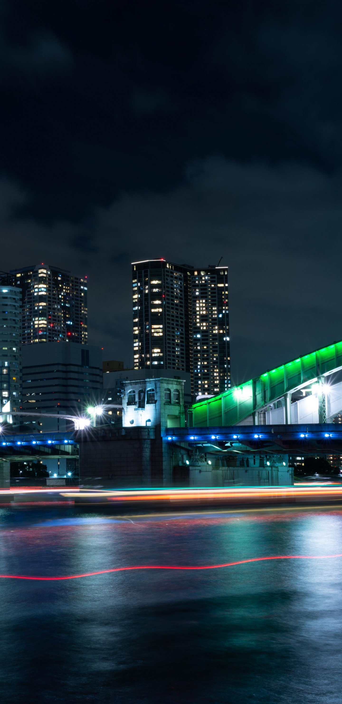 City Skyline During Night Time. Wallpaper in 1440x2960 Resolution