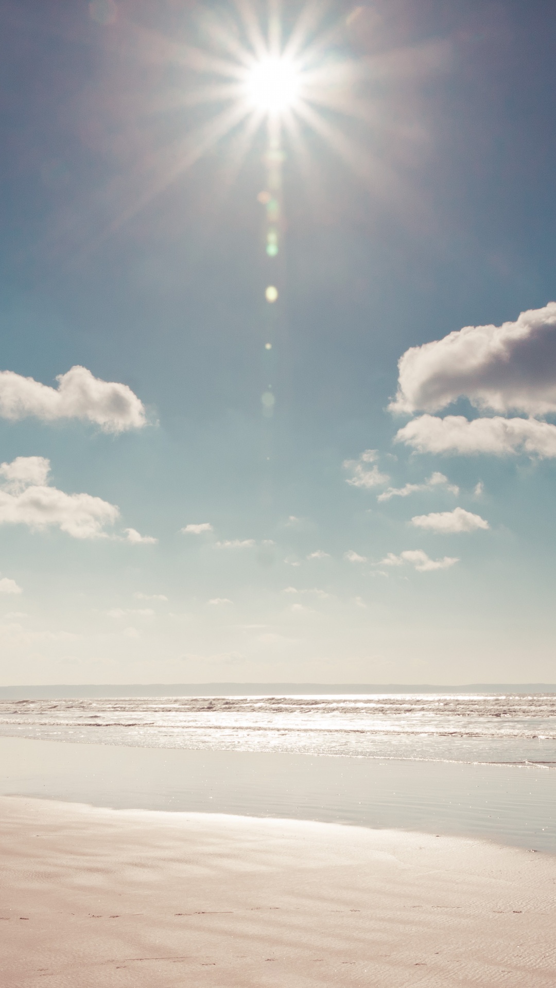 White Clouds and Blue Sky Over The Sea. Wallpaper in 1080x1920 Resolution