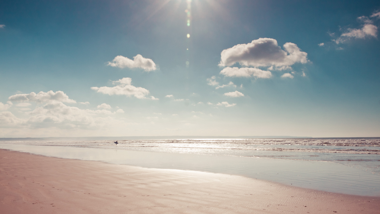 White Clouds and Blue Sky Over The Sea. Wallpaper in 1280x720 Resolution