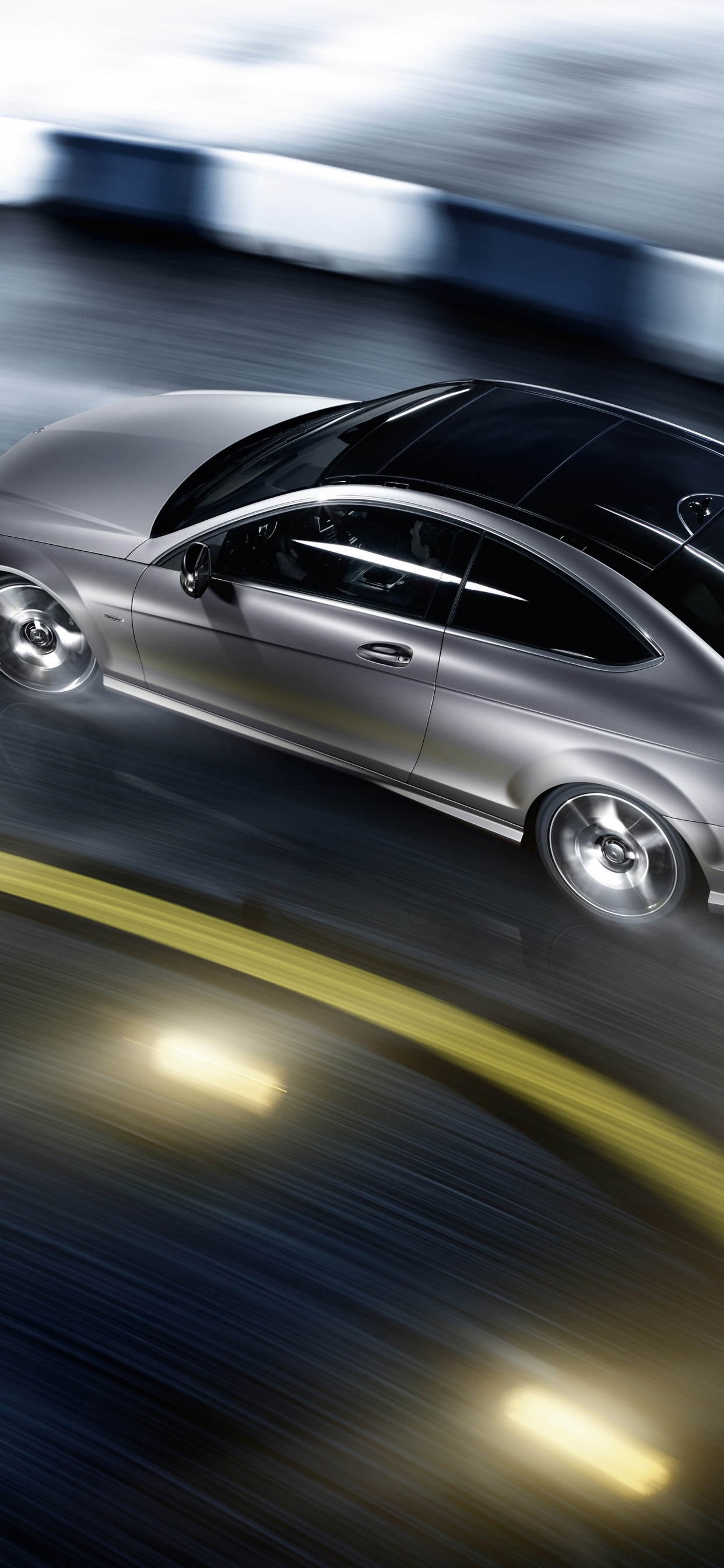 Black Porsche 911 on Road. Wallpaper in 1242x2688 Resolution