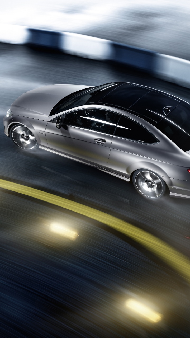 Black Porsche 911 on Road. Wallpaper in 720x1280 Resolution