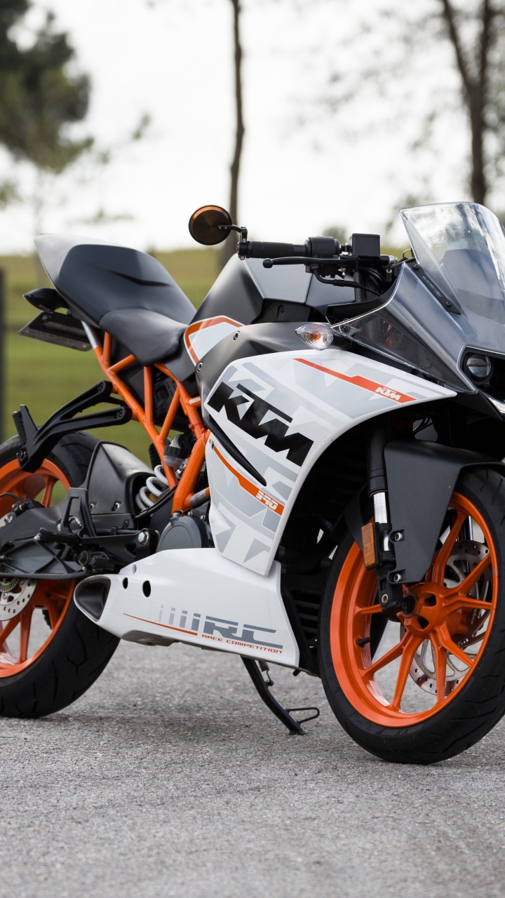 White and Black Sports Bike on Road During Daytime. Wallpaper in 720x1280 Resolution