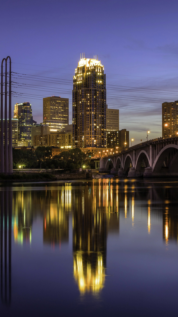 Bridge Over Water During Night Time. Wallpaper in 750x1334 Resolution