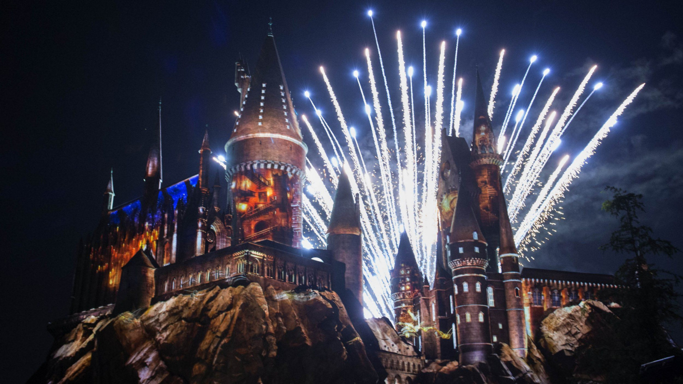 Brown and Blue Castle With Lights During Night Time. Wallpaper in 1366x768 Resolution