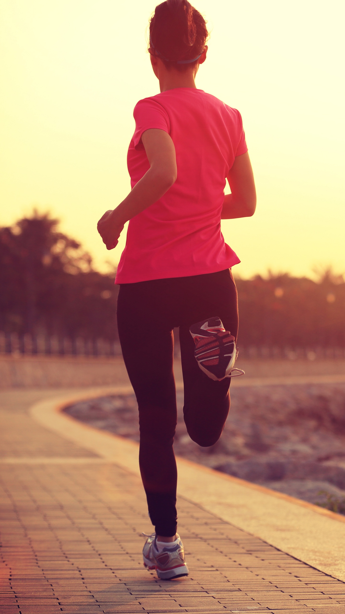 Man in Pink Crew Neck T-shirt and Black Pants Standing on Gray Concrete Pavement During. Wallpaper in 1440x2560 Resolution