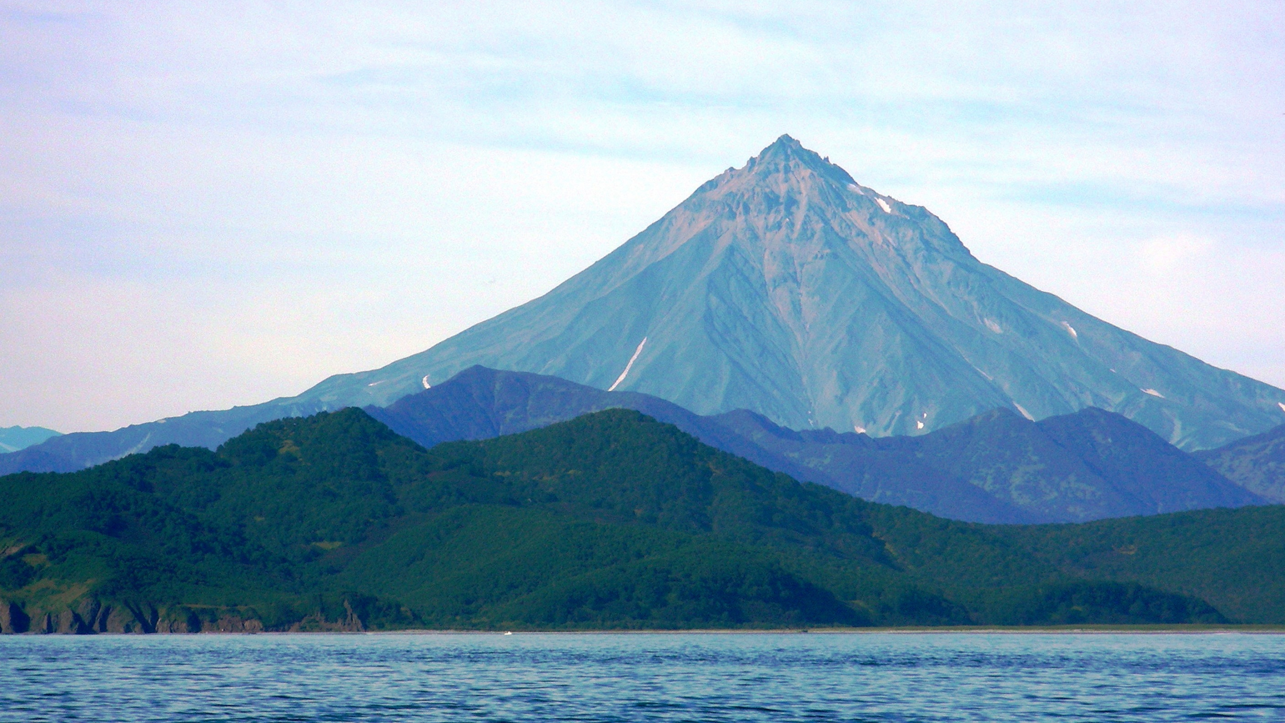 Green and Brown Mountain Under White Clouds During Daytime. Wallpaper in 2560x1440 Resolution