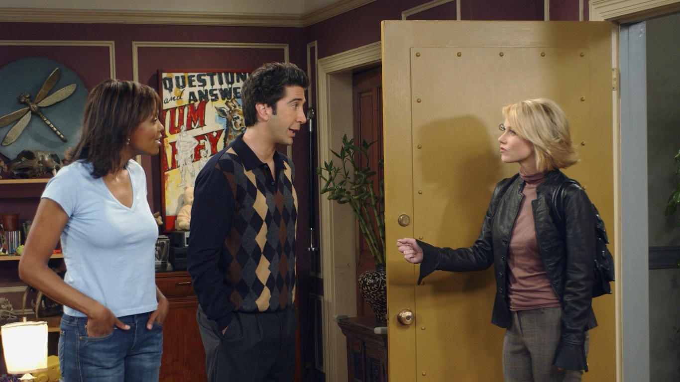 Homme en Chemise à Manches Longues à Rayures Noires et Blanches Debout à Côté D'une Femme en Jean Bleu. Wallpaper in 1366x768 Resolution